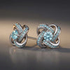 Celtic Knot™ Earrings — 18K White Gold | Aquamarine