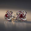 Celtic Knot™ Earrings — 18K White Gold | Garnet